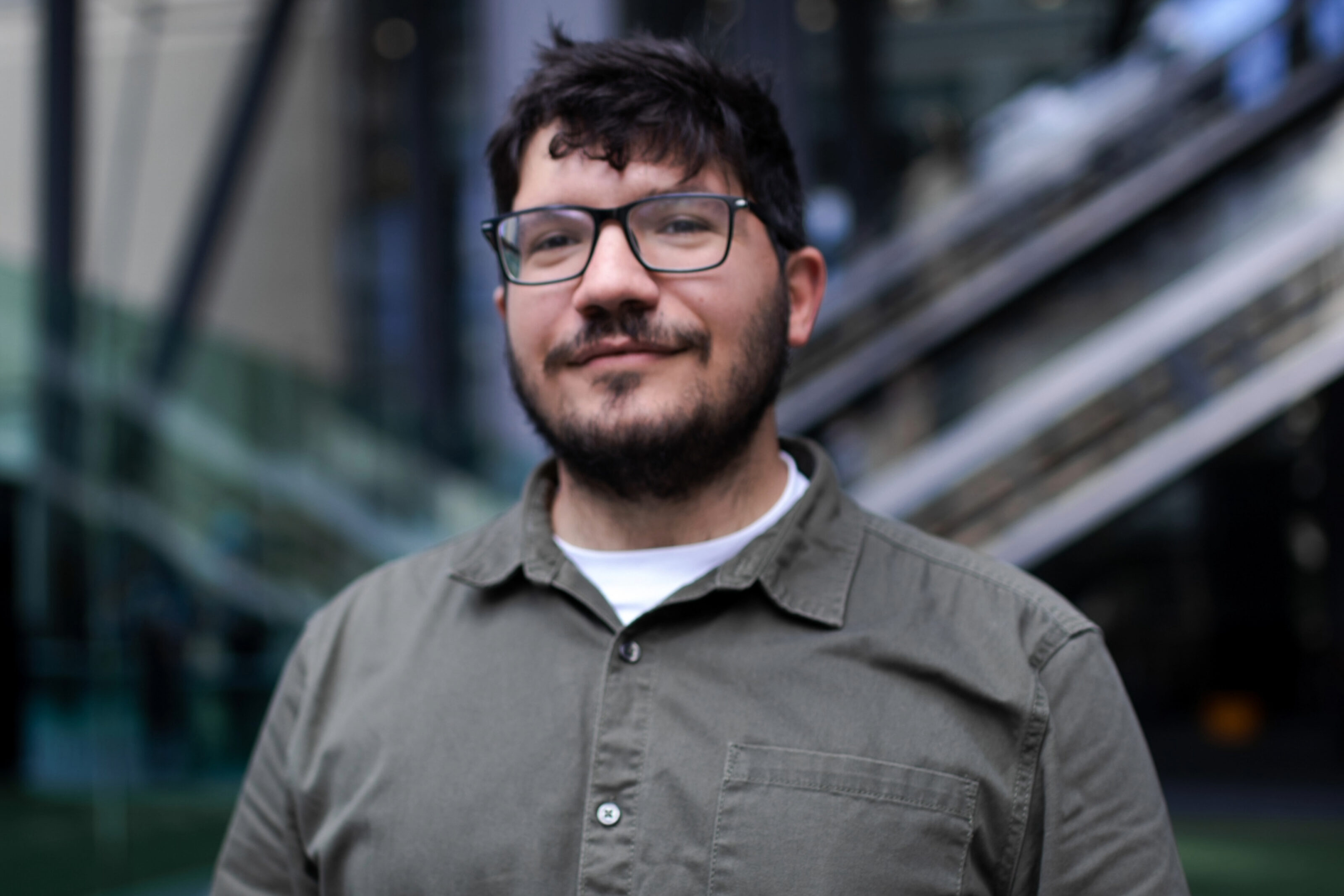 Man standing outside of modern office
