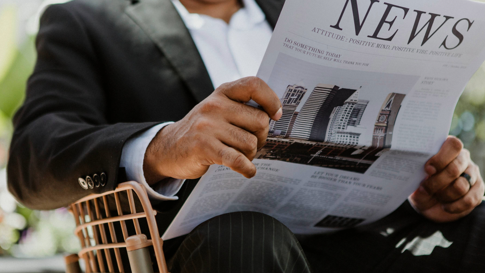 Man reading newspaper